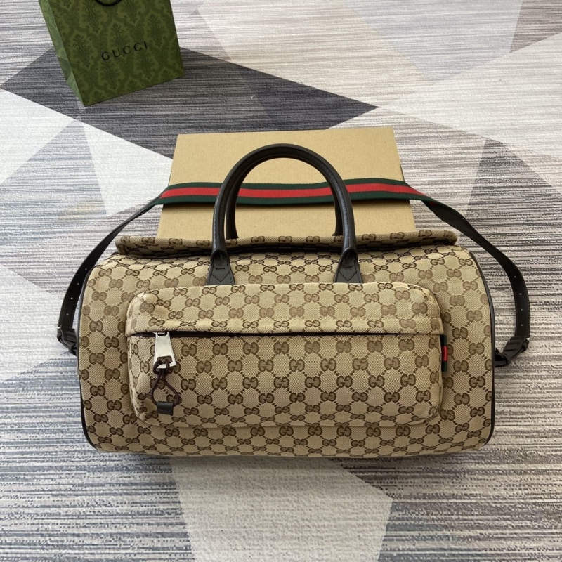 G*u*i top handle bags